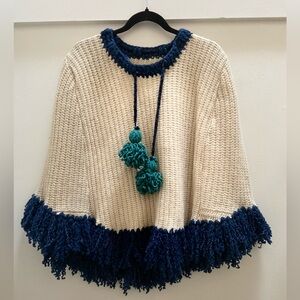 Handknit wool cream and blue fringed poncho